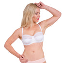 Woman wearing a white lace balconette bra, showing elegant and supportive lingerie design for everyday comfort and style.
